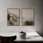 Amalfi Coastline Canvas Art – set of 2 vertical Amalfi coastline landscape prints in a gold floating frame in a dining room