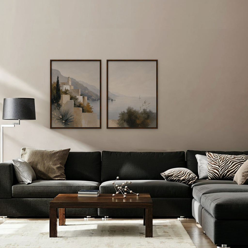 Amalfi Coastline Canvas Art – set of 2 vertical Amalfi coastline landscape prints in a walnut floating frame in a taupe living room
