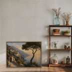 Amalfi Pine Sunset Canvas Art – horizontal Amalfi sunset landscape print in an oak floating frame styled on a shelf
