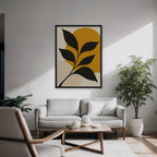 Black Leaf on Gold Canvas Art - Vertical – Black Floating Frame in room setting