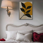 Black Leaf on Gold Canvas Art - Vertical – Silver Floating Frame in room setting