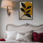 Black Leaf on Gold Canvas Art - Vertical – Walnut Floating Frame in room setting