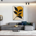 Black Leaf on Gold Canvas Art - Vertical – White Floating Frame in room setting