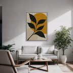 Black Leaf on Gold Canvas Art - Vertical – White Floating Frame in room setting