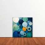 Blue Textured Circles Canvas Art – square blue and teal geometric abstract print as a gallery-wrapped canvas leaning against a white wall