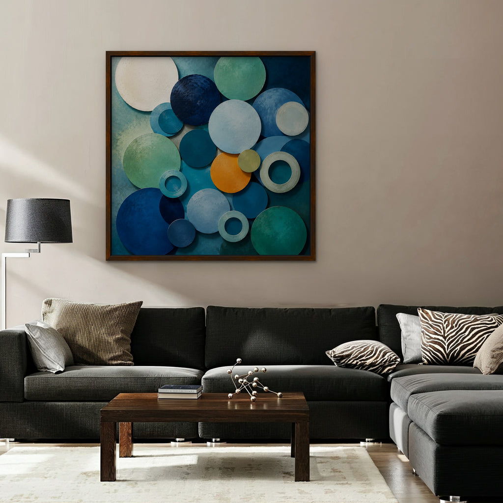 Blue Textured Circles Canvas Art – square blue and teal geometric abstract print in a walnut floating frame in a taupe living room
