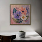 Blush Pink Bouquet Canvas Art – square blush pink floral print in a gold floating frame in a dining room