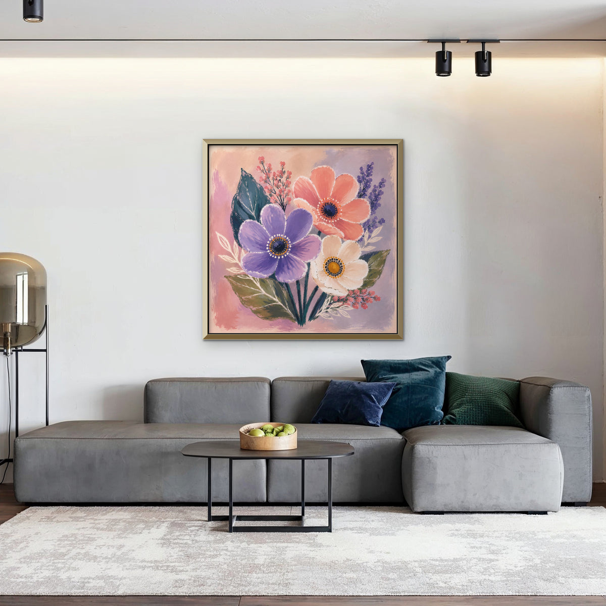 Blush Pink Bouquet Canvas Art – square blush pink floral print in a gold floating frame in a living room with charcoal accents