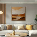 Burnt Orange Valley Canvas Art – square burnt orange desert landscape print in an oak floating frame in a bright living room