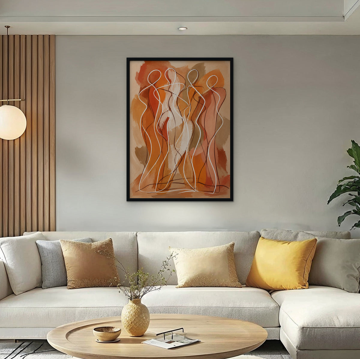 Dancing Figures Canvas Art – vertical orange figurative line art print in a black floating frame in a bright living room