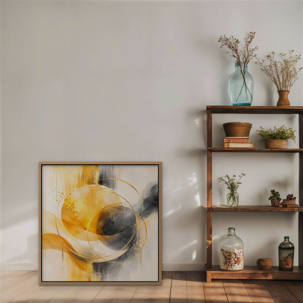 Golden Orbit Canvas Art – square golden yellow abstract print in an oak floating frame styled on a shelf