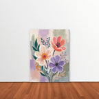 Lilac Garden Bouquet Canvas Art – vertical violet and coral floral print as a gallery-wrapped canvas leaning against a white wall