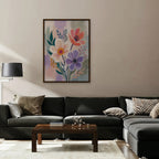 Lilac Garden Bouquet Canvas Art – vertical violet and coral floral print in a walnut floating frame in a taupe living room