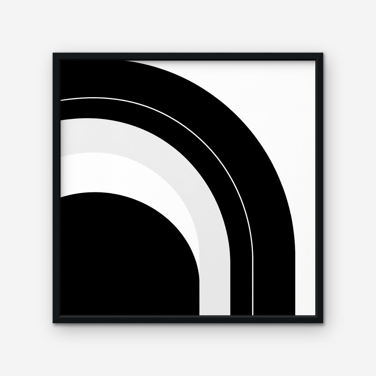 Monochrome Arc Canvas Art – square black and white geometric abstract print in a black floating frame on a white background