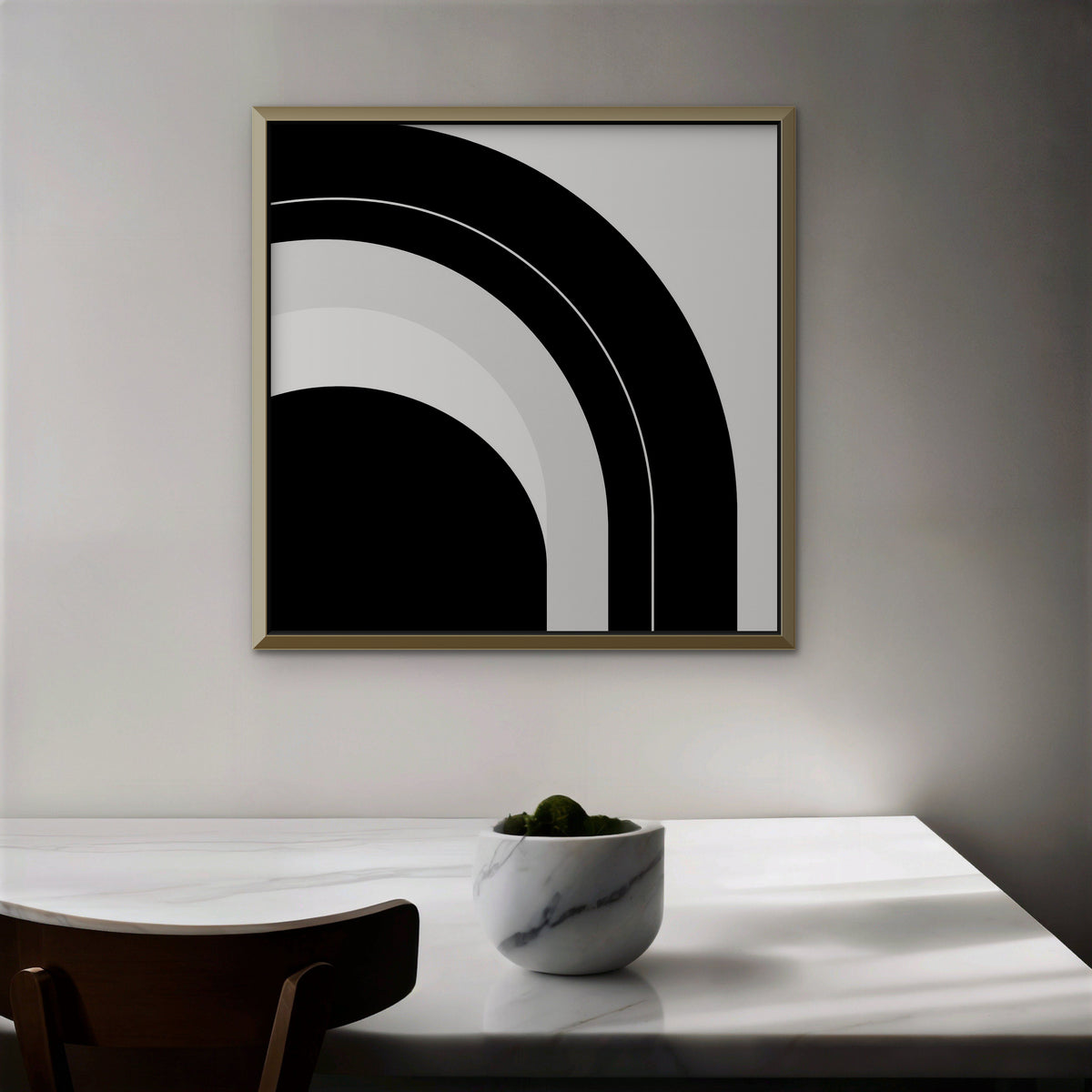 Monochrome Arc Canvas Art – square black and white geometric abstract print in a gold floating frame in a dining room