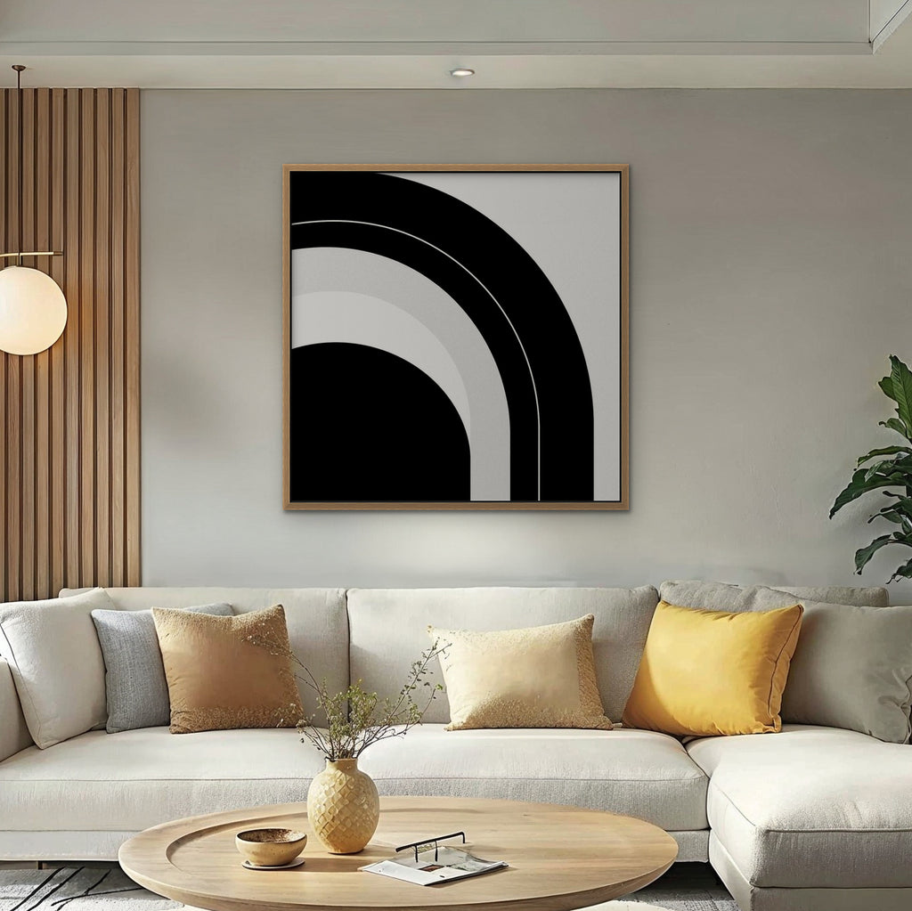 Monochrome Arc Canvas Art – square black and white geometric abstract print in an oak floating frame in a bright living room