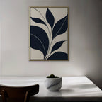 Navy Leaf Stems Canvas Art - Vertical – Gold Floating Frame in room setting