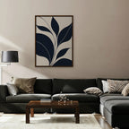 Navy Leaf Stems Canvas Art - Vertical – Walnut Floating Frame in room setting
