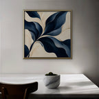 Navy Leaf Sweep Canvas Art - Square – Gold Floating Frame in room setting