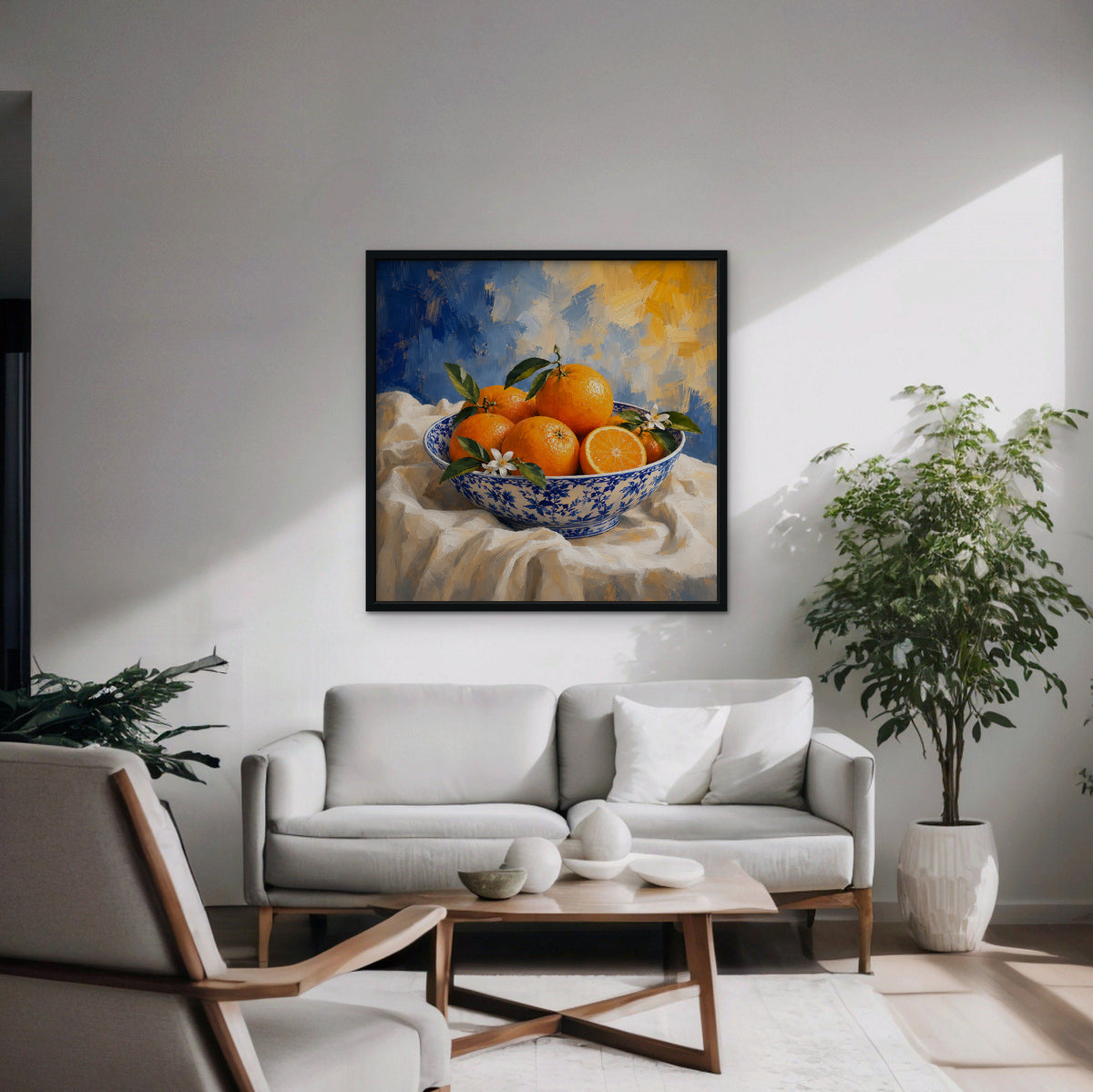 Oranges in Blue Porcelain Canvas Art – square orange and cobalt still life print in a black floating frame in a modern living room