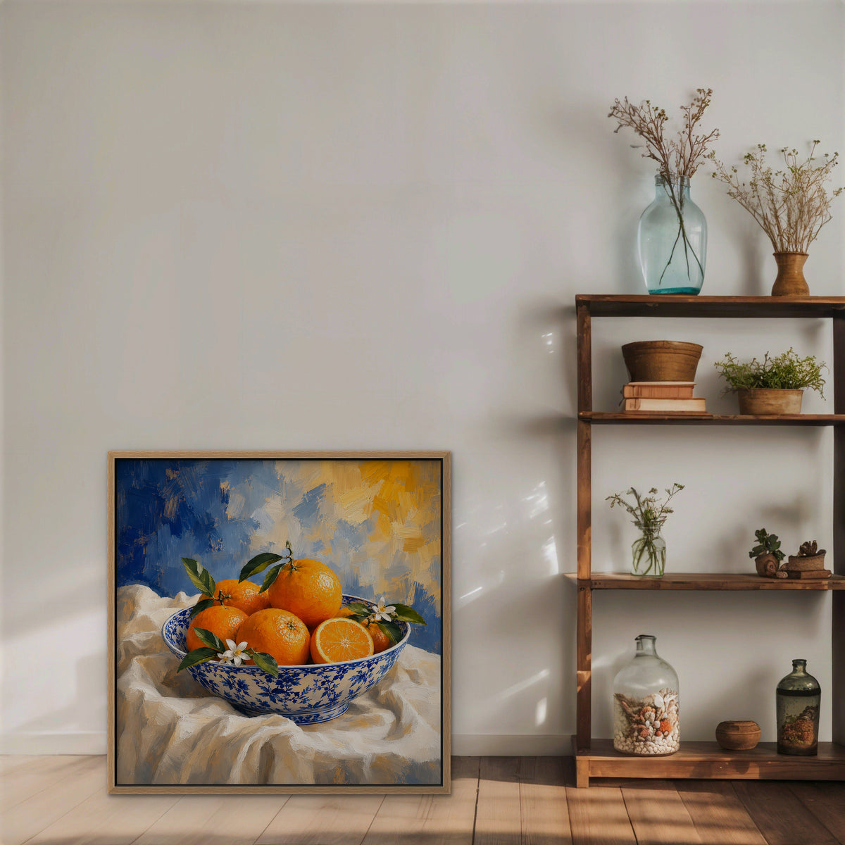 Oranges in Blue Porcelain Canvas Art – square orange and cobalt still life print in an oak floating frame styled on a shelf