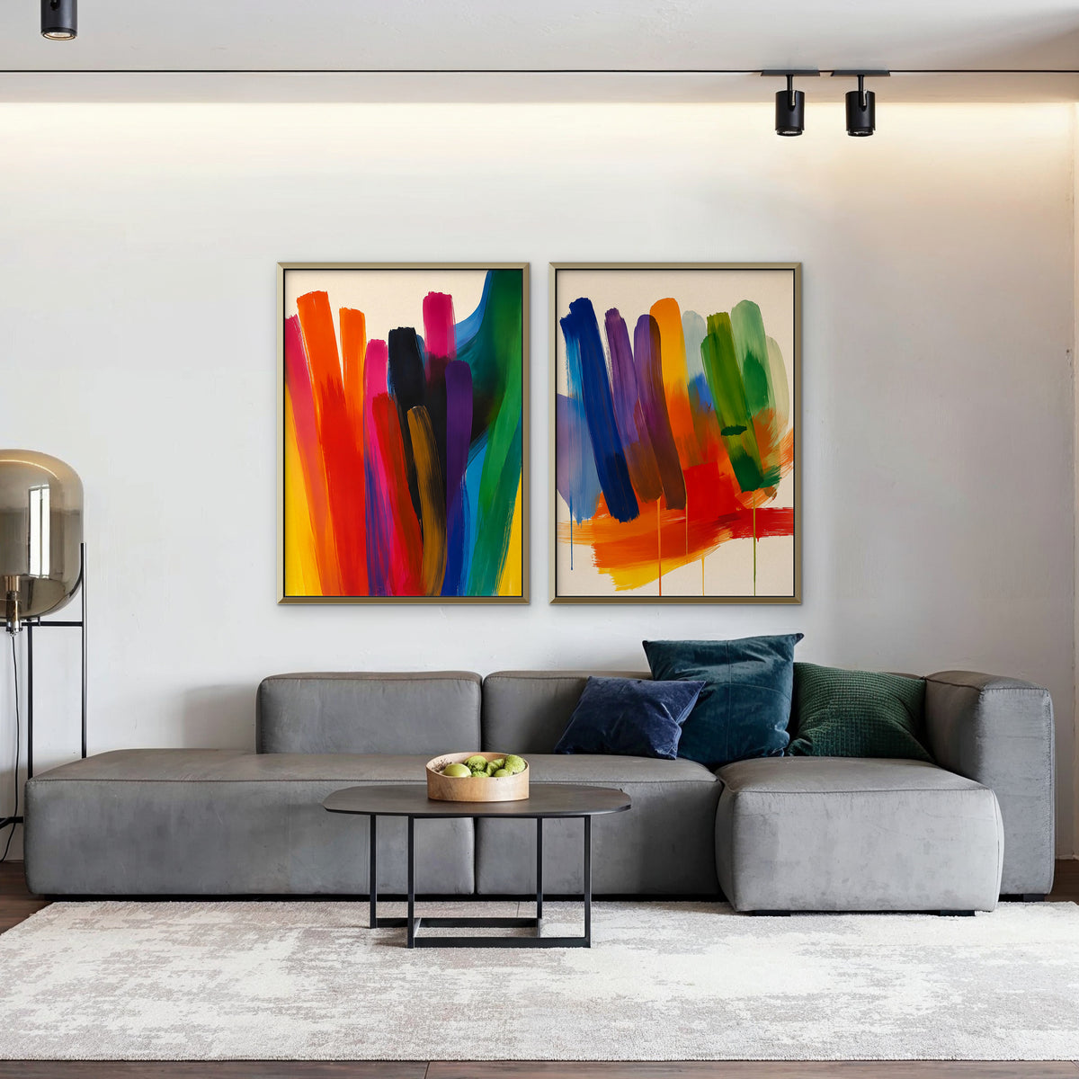 Rainbow Brushstrokes Canvas Art – set of 2 vertical multicolor brushstroke abstract prints in a gold floating frame in a living room with charcoal accents