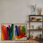 Rainbow Brushstrokes Canvas Art – set of 2 vertical multicolor brushstroke abstract prints in an oak floating frame styled on a shelf