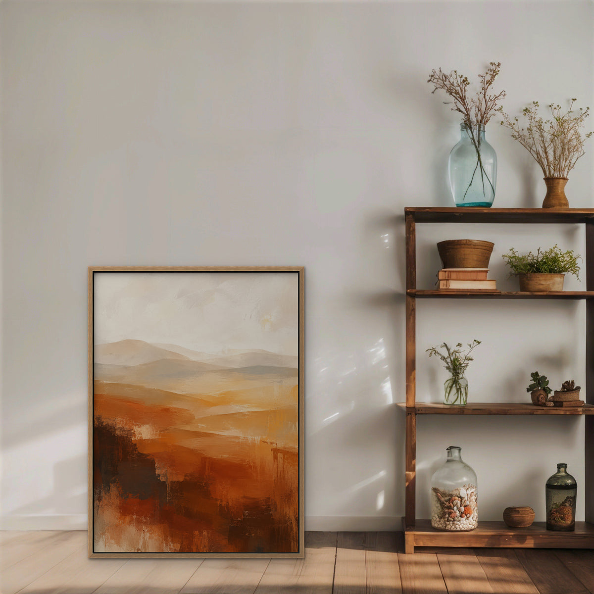 Rust Hills at Dusk Canvas Art – vertical rust and ochre abstract landscape print in an oak floating frame styled on a shelf