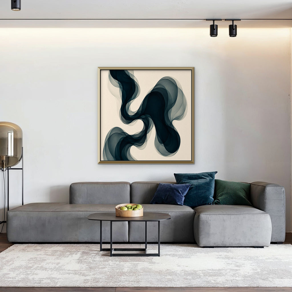 Smoky Teal Drift Canvas Art – square navy and teal abstract print in a gold floating frame in a living room with charcoal accents