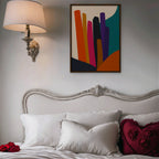 Vivid Color Columns Canvas Art – vertical bold multicolor abstract print in a walnut floating frame in a bedroom