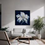 White Lily on Navy Canvas Art - Square – Black Floating Frame in room setting