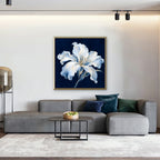 White Lily on Navy Canvas Art - Square – Gold Floating Frame in room setting